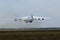 Airlift cargo aircraft Antonov 225 Mriya taking off from a runway of Hostomel airport, its first commercial flight. Was