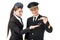 Airline captain and stewardess holding toy plane