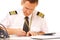 Airline pilot filling in papers
