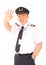 Airline pilot waving