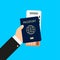 Airline ticket passport in the hand of man