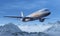 Airliner flight over the snowy mountains