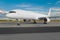 Airliner on the ground, freighter plane with blank white paintwork