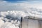 Airliner jet engine and cloudy sky