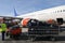 Airliner loaded with suitcases