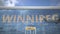 Airliner reflecting in the windows of airport terminal with WINNIPEG text. 3d rendering