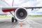 Airplane on airfield, airliner on runway, airplane wing and turbine close up, air engine, aviation banner, travel poster, vacation