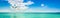 Airplane banner. Plane above the sea. Travel background.