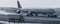 Airplane beeing towed on a runway cyan look