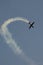 Airplane in blue sky fly make loop and crash