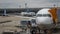 Airplane at boarding gate having freight loaded