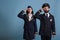 Airplane captain and stewardess saluting portrait