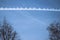 Airplane chemtrails in sky above Nottinghamshire, England