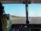 Airplane cockpit view on tarmac runway, just before taking off