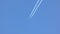 Airplane Contrail - Flying In the Blue Sky