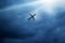 Airplane in dark blue sky and cloud in strom