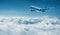 Airplane flies above clouds - air travel