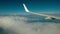 Airplane flight. View through the window of an airplane of the wing and turbine.