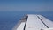 Airplane flying into the clouds. view through an airplane window. traveling