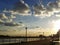 Airplane flying from London city airport, royal Albert docks sunset