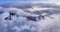 Airplane flying near the Beautiful Canadian Mountain Nature Landscape