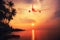 Airplane flying over amazing tropical sunset landscape