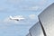 Airplane flying over London Thames Barriers