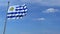 Airplane flying over waving flag of Uruguay