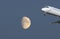 Airplane and half-moon