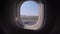 Airplane hard landing, passenger first-person view through the window.