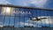 Airplane landing at Asmara Eritrea airport mirrored in terminal