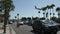 Airplane landing at Los Angeles International Airport with a COVID Testing Station in the foreground super slow motion