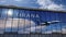 Airplane landing at Tirana Albania airport mirrored in terminal