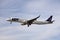 A airplane of LOT Polish airlines flying in the sky