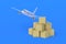 Airplane near stack of boxes on blue background