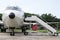 Airplane nose with passenger stairs