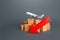 Airplane over boxes and red down arrow. Decline of goods transportation volume, world trade traffic delays. Delivery by air