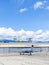 Airplane parked with radar towers over the hangar