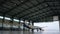 Airplane parking in hangar. Airplane arrives at the hangar of the airport. Boeing