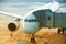 Airplane preparing to take off at the airport, passenger boarding bridge attached to the aircraft