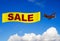 Airplane with sale banner