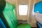 Airplane seat near windows in cabin of huge aircraft