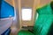 Airplane seat near windows in cabin of huge aircraft