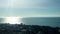 Airplane takeoff in the summer sky above the city.Camera in cabin of pilot