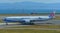 Airplane taxiing on runway of Kansai Airport