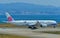 Airplane taxiing on runway of Kansai Airport