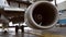 Airplane turbine close-up. Aircraft repair in the hangar. Engine, blades. Mechanism. Passenger airplane close-up disassembled. Pla