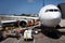 Airplane Unloading the Luggages at the Airport