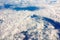 Airplane view of beautiful blue sky horizon with clouds