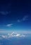 Airplane view of blue sea and blue sky